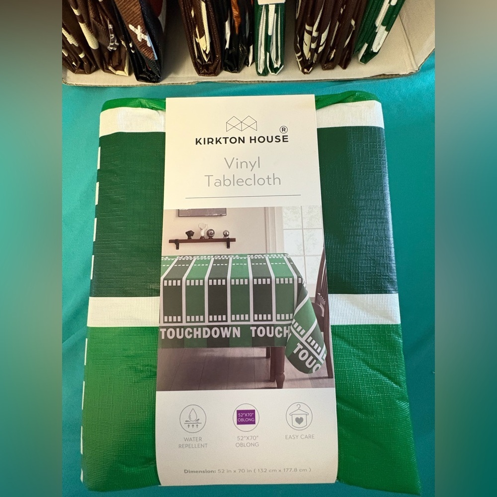 New- Football Inspired
Reusable Tablecloth
Set of 3. Two 52x70 & 1- 70Round- - Picture 8 of 11